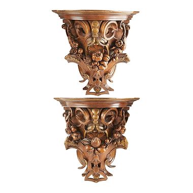 PAIR OF CARVED WALNUT PARCEL-GILT WALL BRACKETS, 19th Century